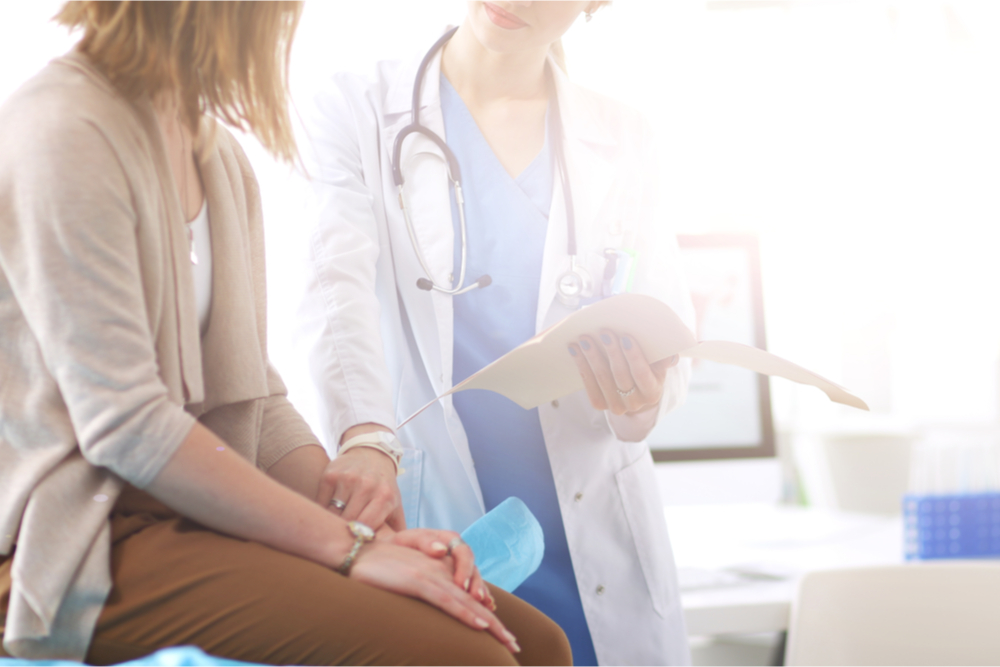 A doctor talking to a patient.